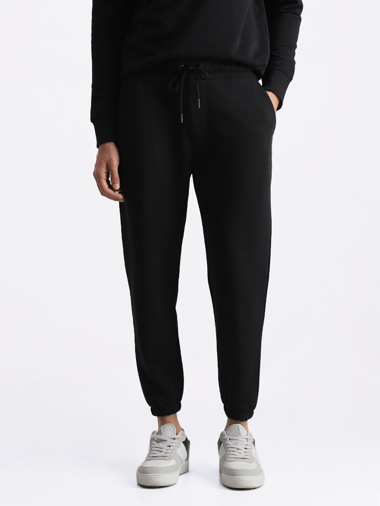 WES Casuals Solid Black Relaxed Fit Trackpants