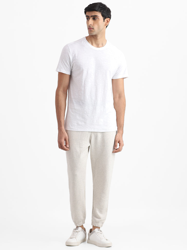WES Casuals Cream Slim Fit Mid Rise Joggers