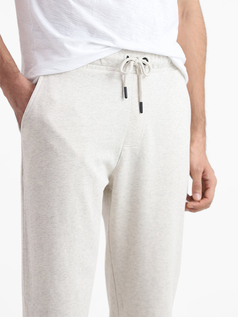 WES Casuals Cream Slim Fit Mid Rise Joggers