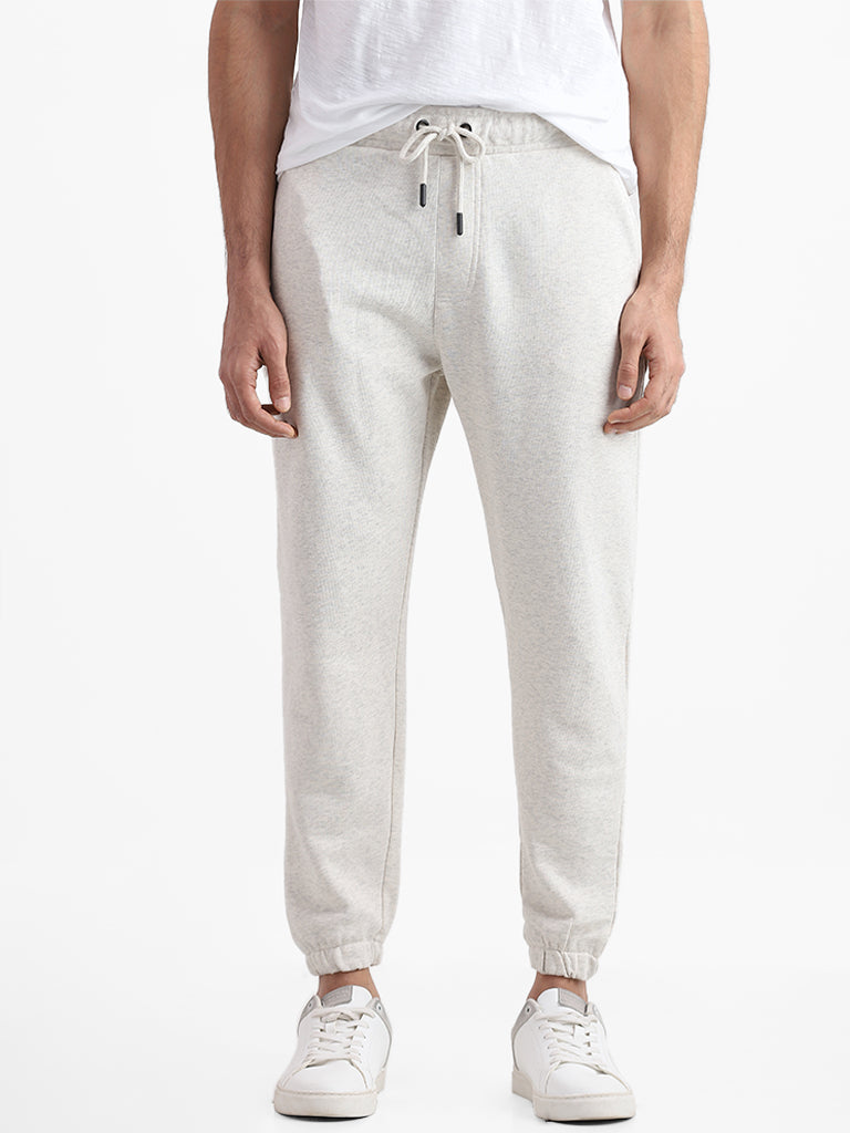 WES Casuals Cream Slim Fit Mid Rise Joggers