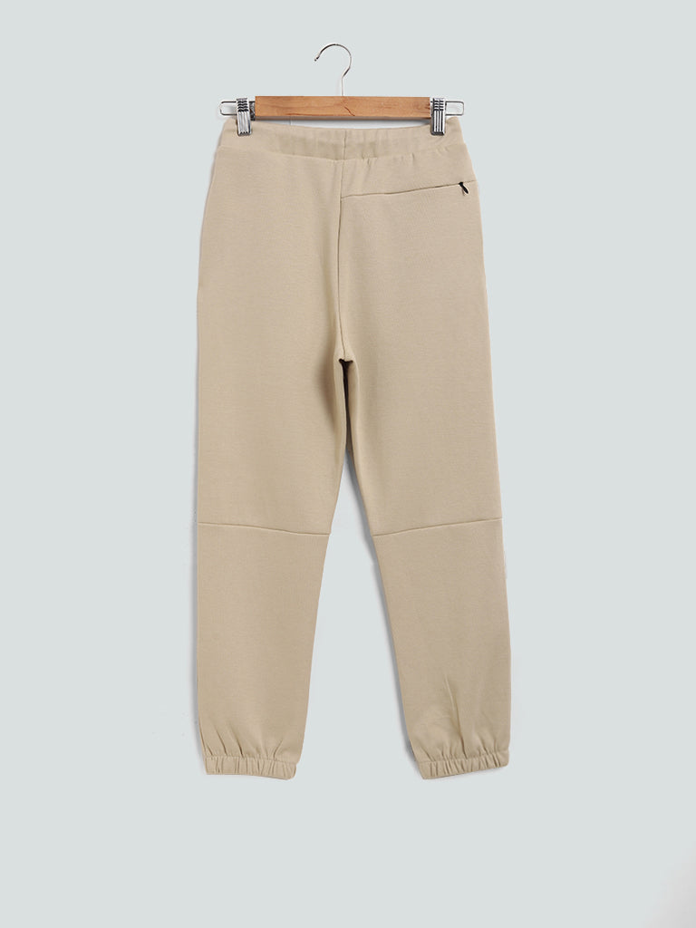 Y&F Kids Beige Solid Eagle Joggers