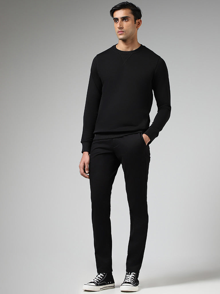 Westside WES Casuals Men's Solid Black Relaxed-Fit Mid-Rise Chinos for Casual Wear Full View