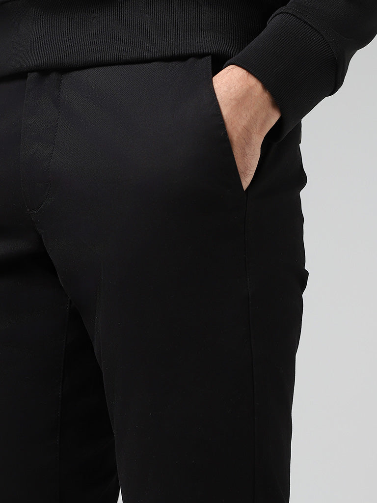 Westside WES Casuals Men's Solid Black Relaxed-Fit Mid-Rise Chinos for Casual Wear Zoomed View
