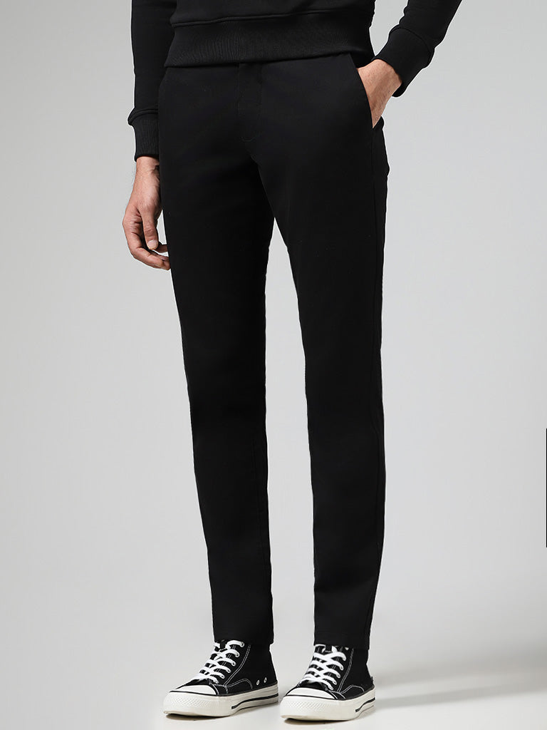 Westside WES Casuals Men's Solid Black Relaxed-Fit Mid-Rise Chinos for Casual Wear Front View