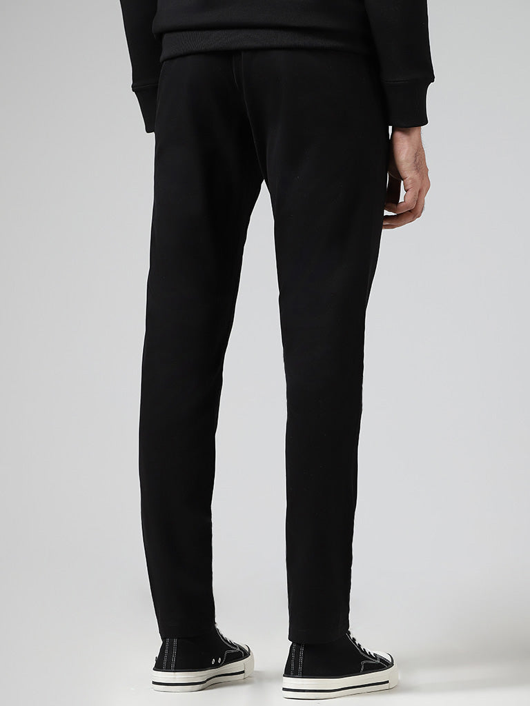 Westside WES Casuals Men's Solid Black Relaxed-Fit Mid-Rise Chinos for Casual Wear Back View