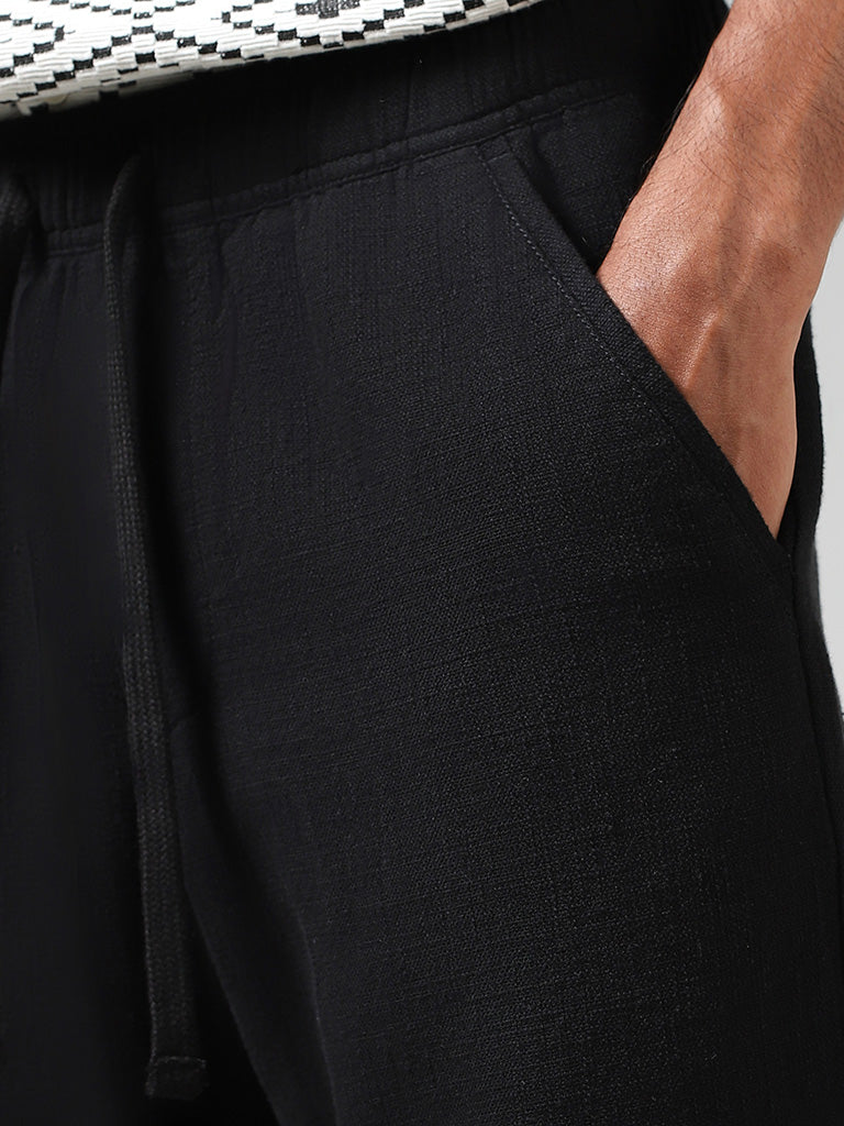 Westside ETA Men's Self Black Cotton Relaxed-Fit Low-Rise Chinos for Casual Wear Zoomed View