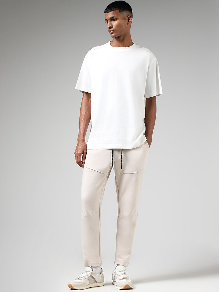 Buy Studiofit Solid Off White Seam Detail Relaxed Fit Track Pants from  Westside