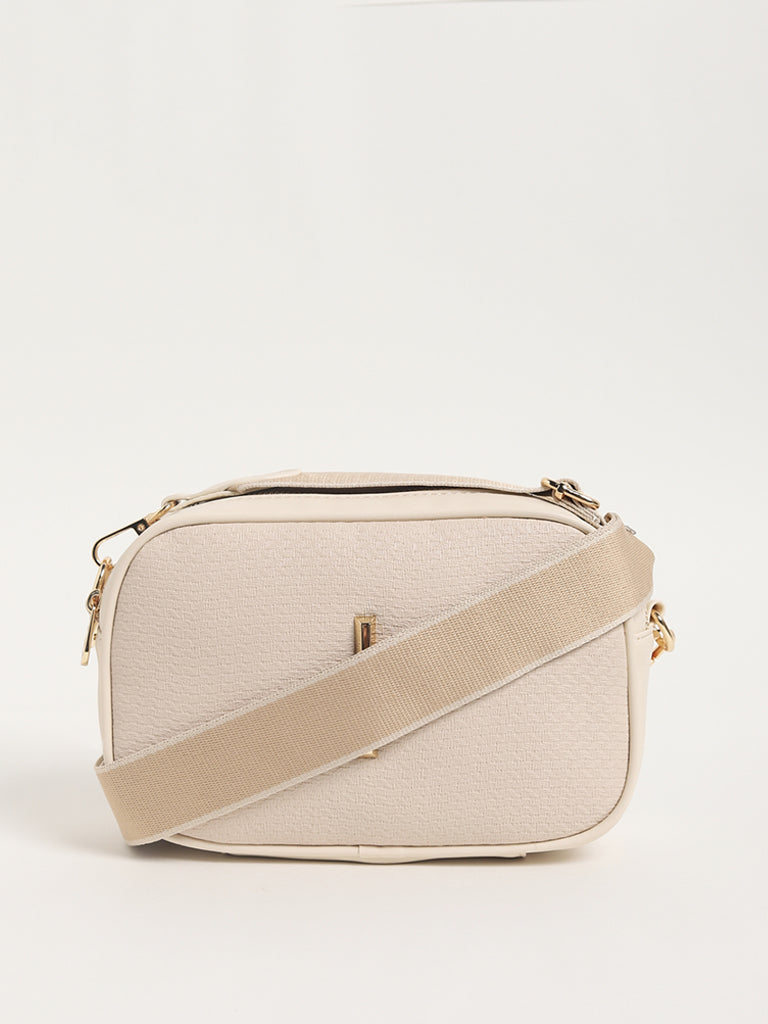 Cream cross body bag deals