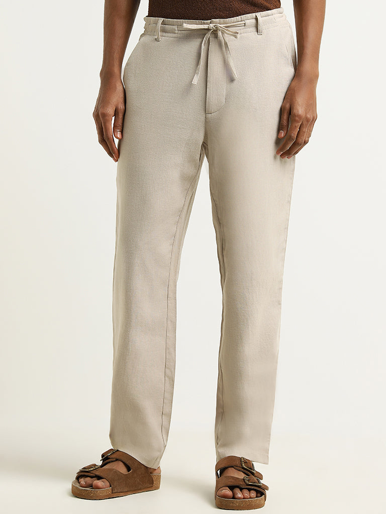 Westside ETA Men's Beige Mid Rise Cotton-Blend Relaxed Fit Trousers for Casual Wear Front View