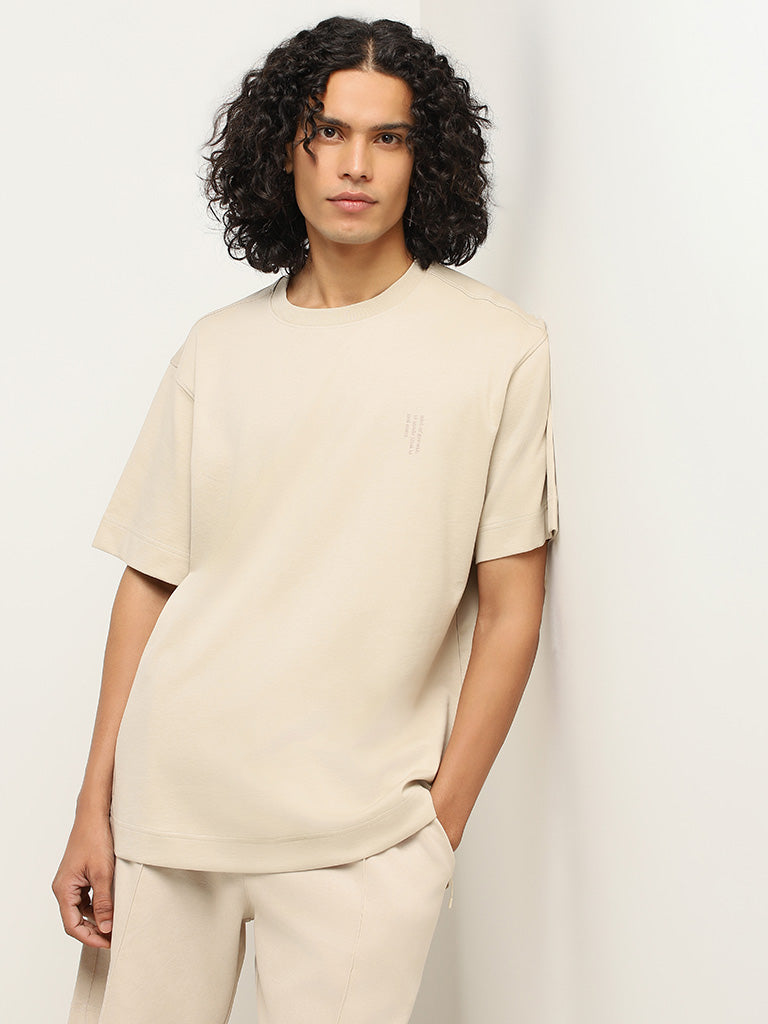Buy Studiofit Plain Beige Relaxed Fit T-Shirt from Westside