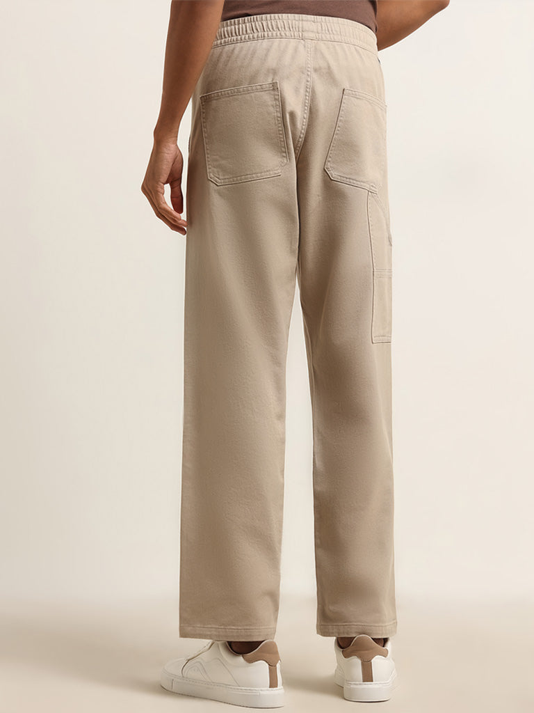 Nuon Beige Relaxed Fit Solid Cotton Mid Rise Pants