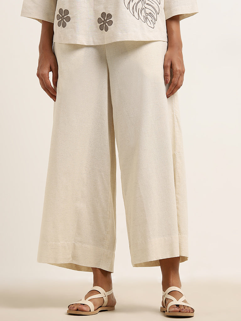 Utsa Beige Flared High-Rise Cotton-Blend Palazzos