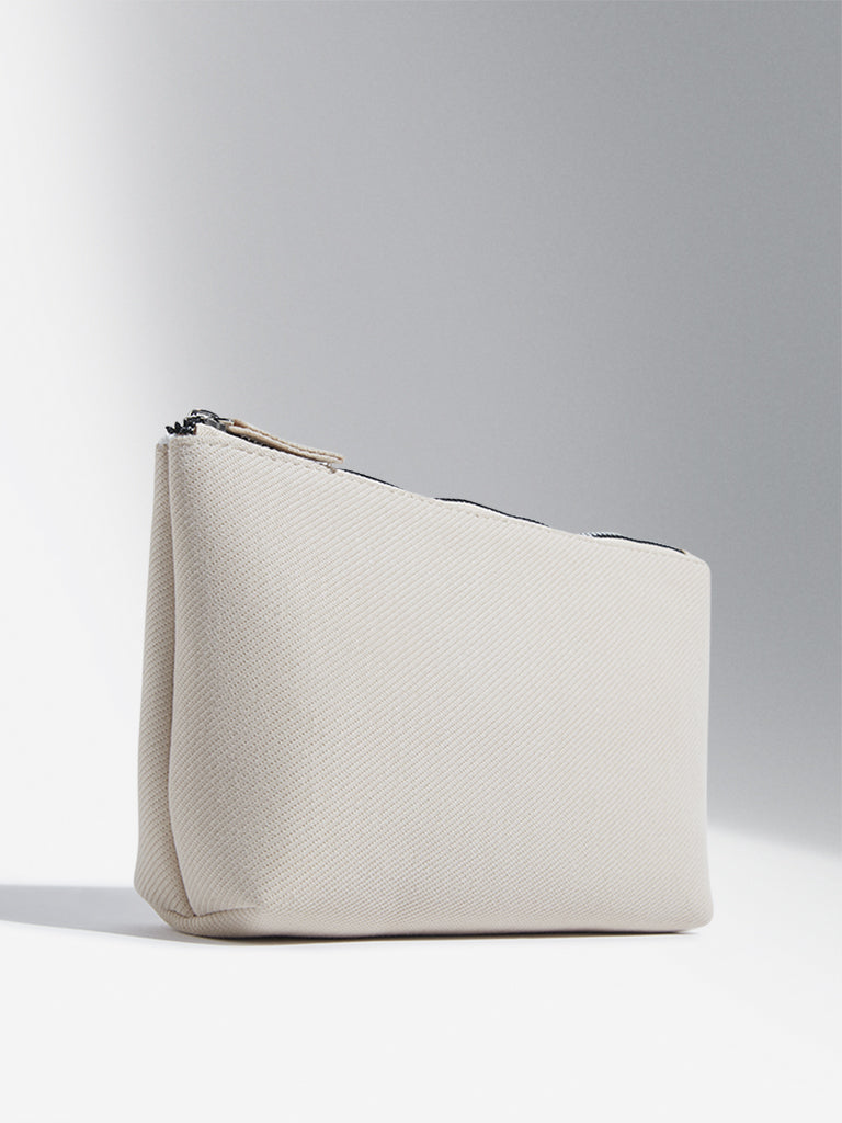 Buy Studiowest Beige Self Textured Pouch from Westside