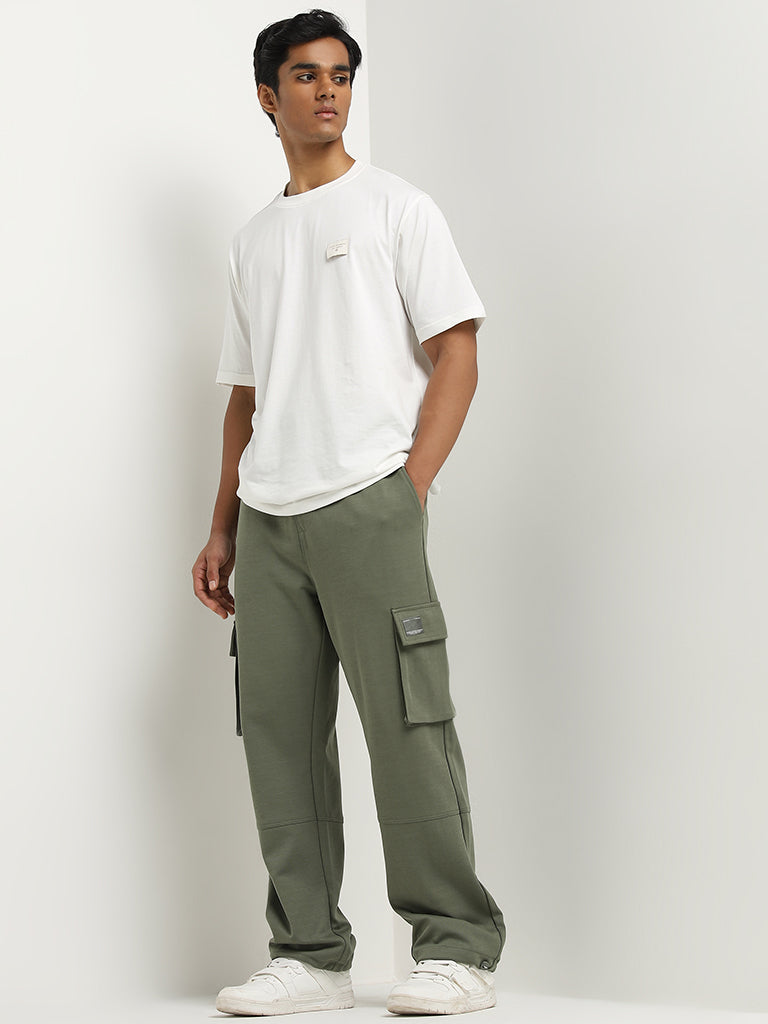 White brandy shirt and olive green pants