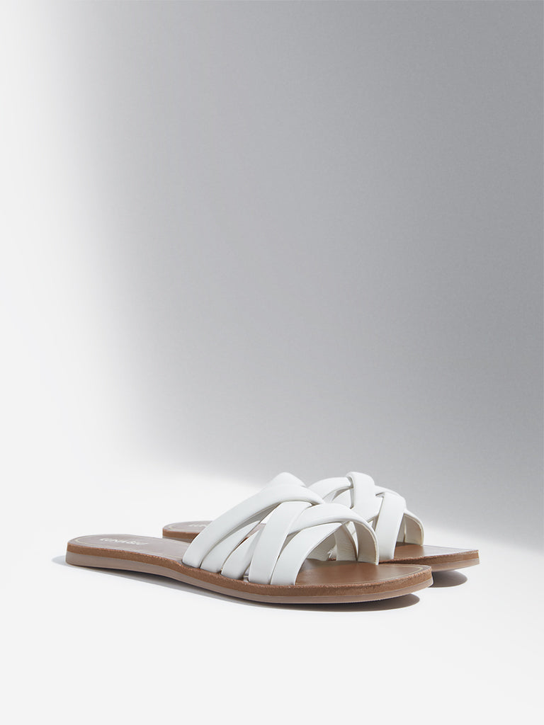 White criss cross slides new arrivals