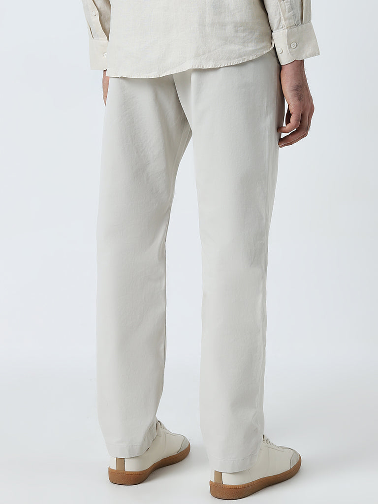 Westside Ascot Men's Off-White Relaxed-Fit Mid-Rise Cotton-Blend Chinos for Casual Wear Back View