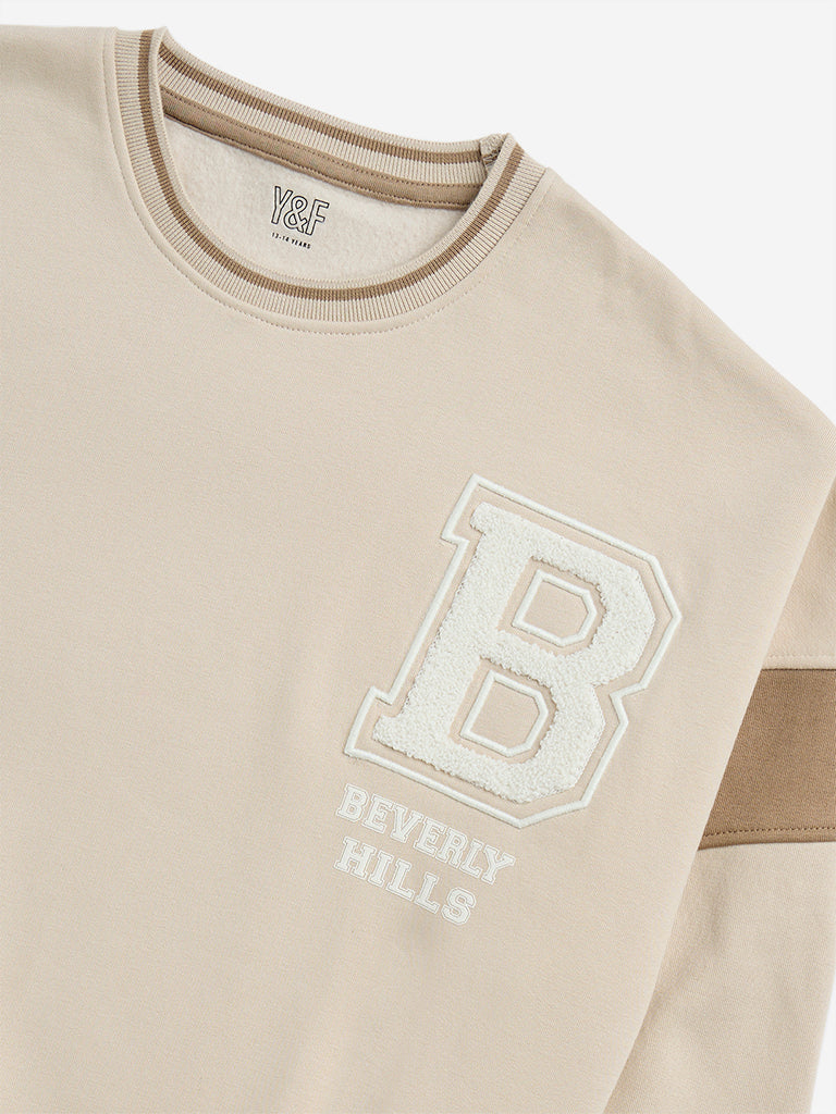 Westside Y&F Girl's Beige Text Printed Cotton-Blend Sweatshirt for Winter Wear Zoomed View