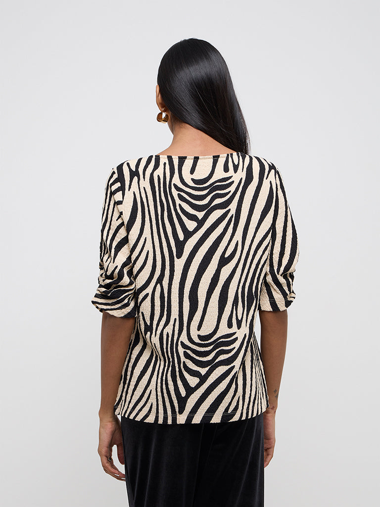 Wardrobe Beige & Black Animal Printed Top