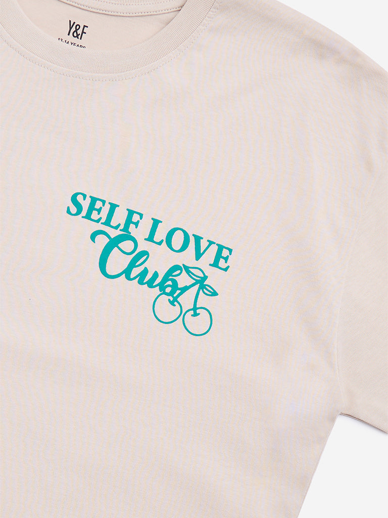 Westside Y&F Girl's Beige Typographic Design Cotton T-Shirt for Casual Wear Zoomed View