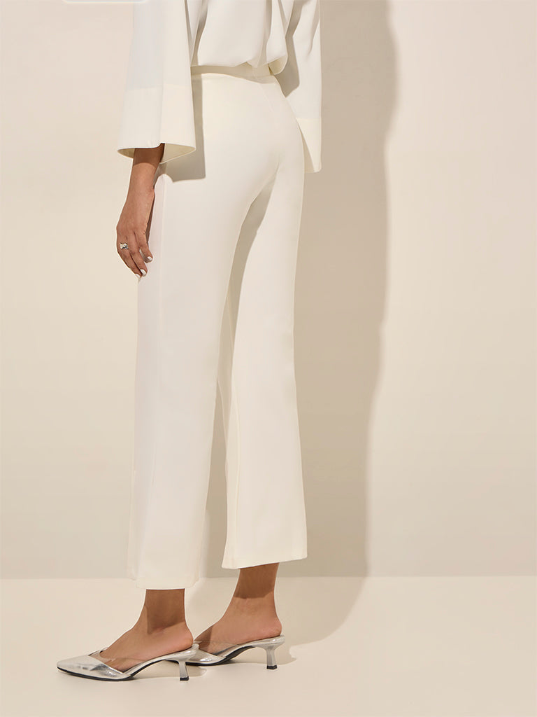 Westside Wardrobe Women's Off-White Slit-Detailed High-Rise Bootcut Trousers for Work Wear Back View