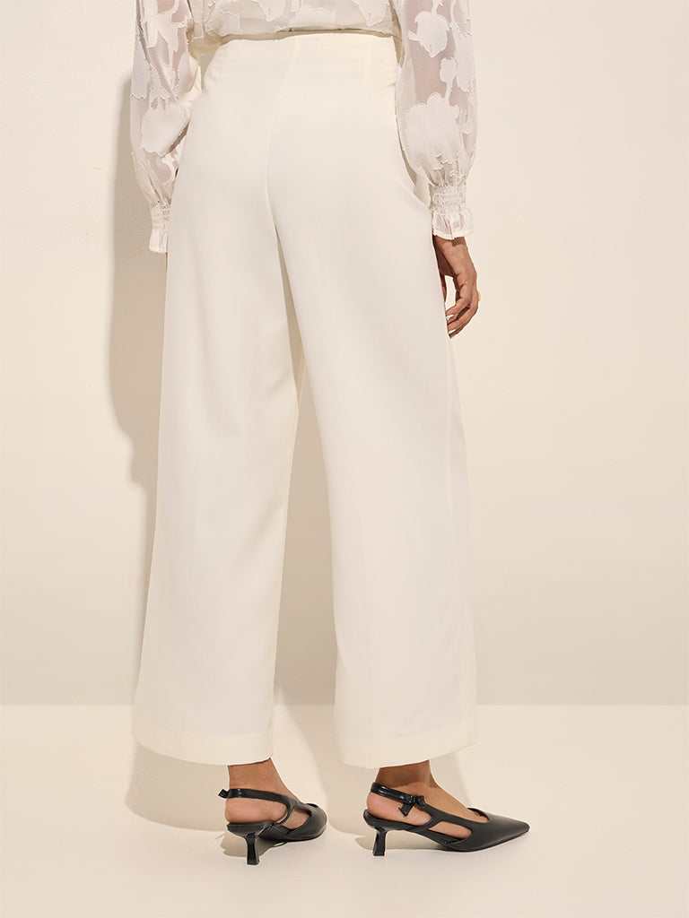 Westside Wardrobe Women's Ivory High-Rise Flared Trousers for Work Wear Back View