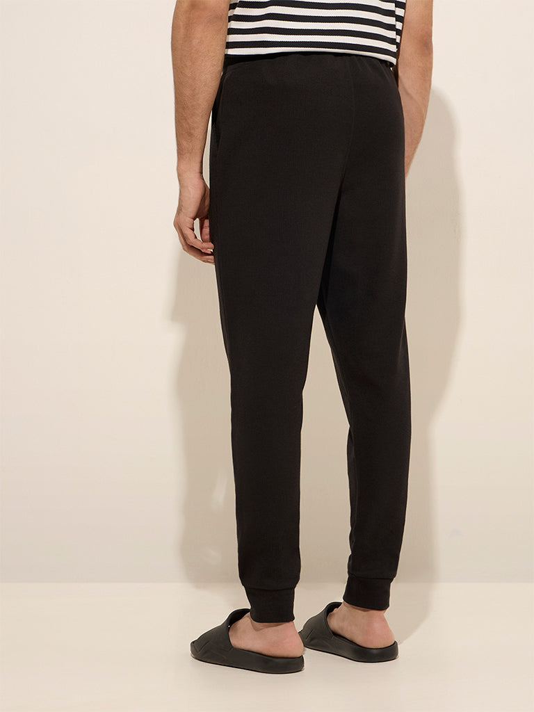 Westside WES Lounge Men's Black Relaxed-Fit Mid Rise Cotton-Blend Joggers for Casual Wear Back View