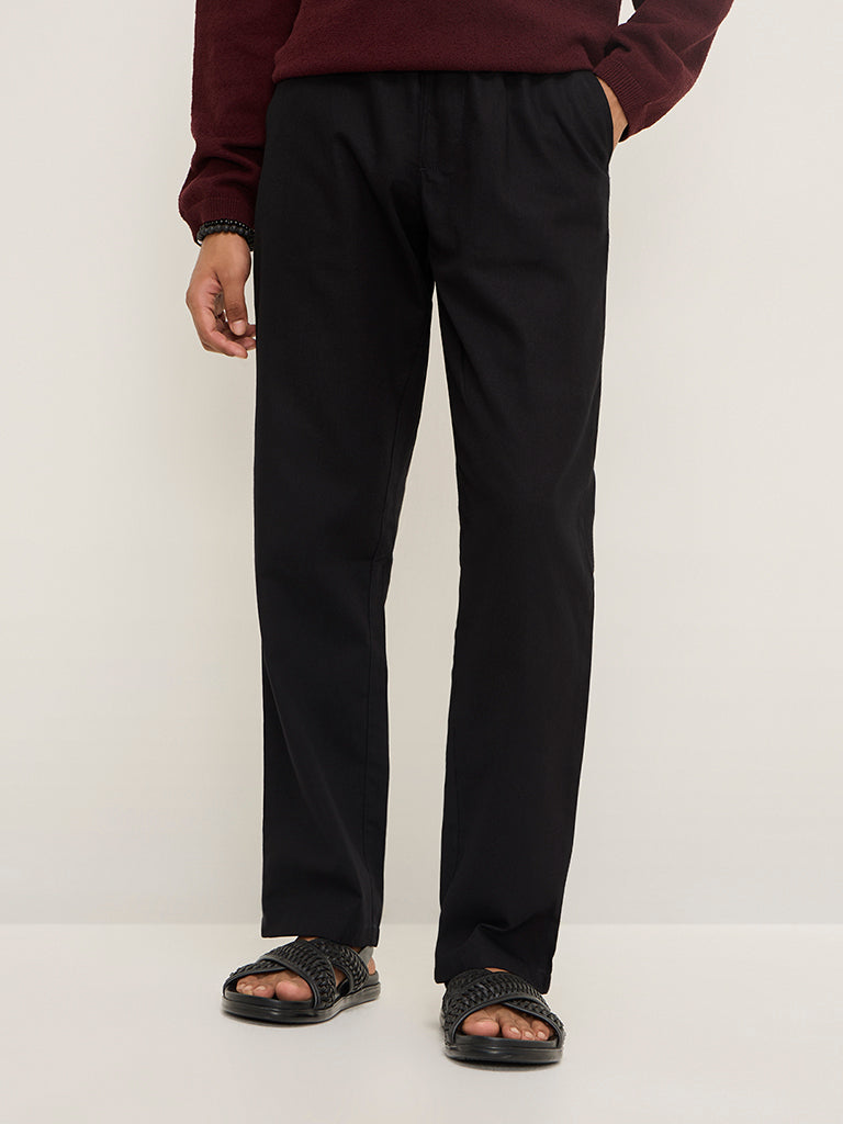 Westside ETA Men's Black Solid Relaxed-Fit Mid-Rise Cotton Chinos for Casual Wear Front View