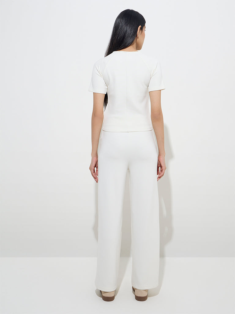 Westside LOV Women's Off-White Solid High-Rise Pants for Casual Wear Back View