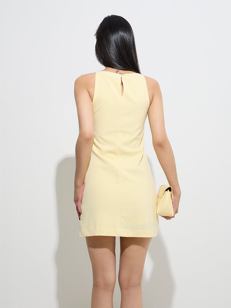 Westside Nuon Women's Yellow Solid Shift Dress for Casual Wear Back View