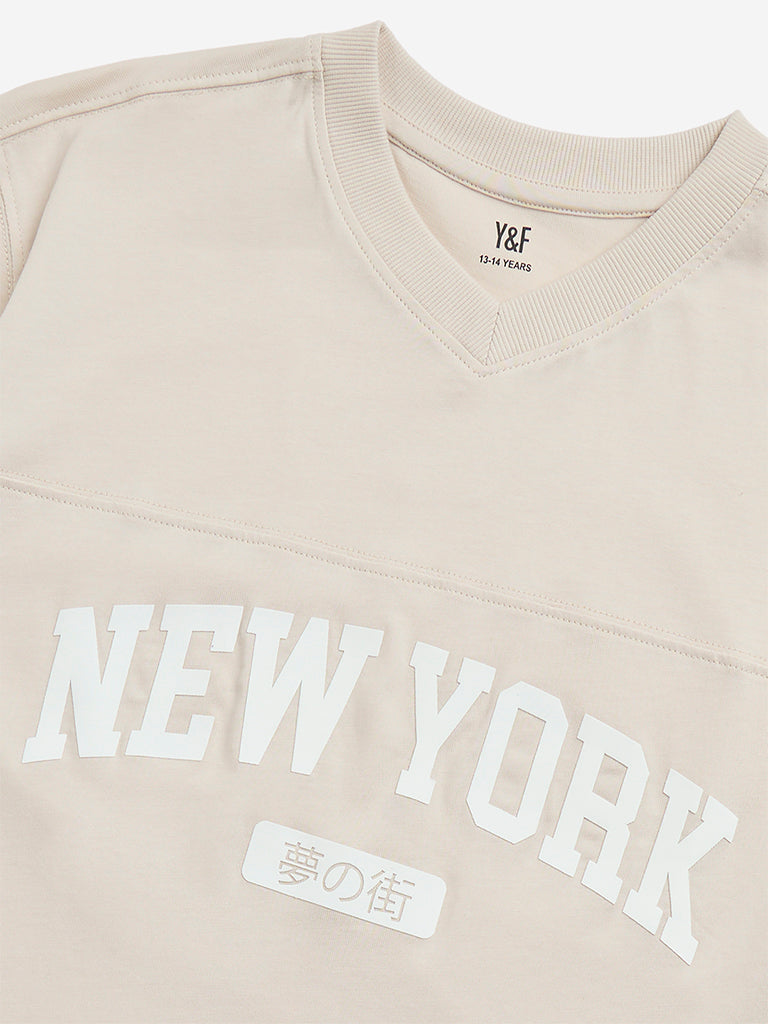 Westside Y&F Boy's Beige Text Printed Cotton T-Shirt for Casual Wear Zoomed View