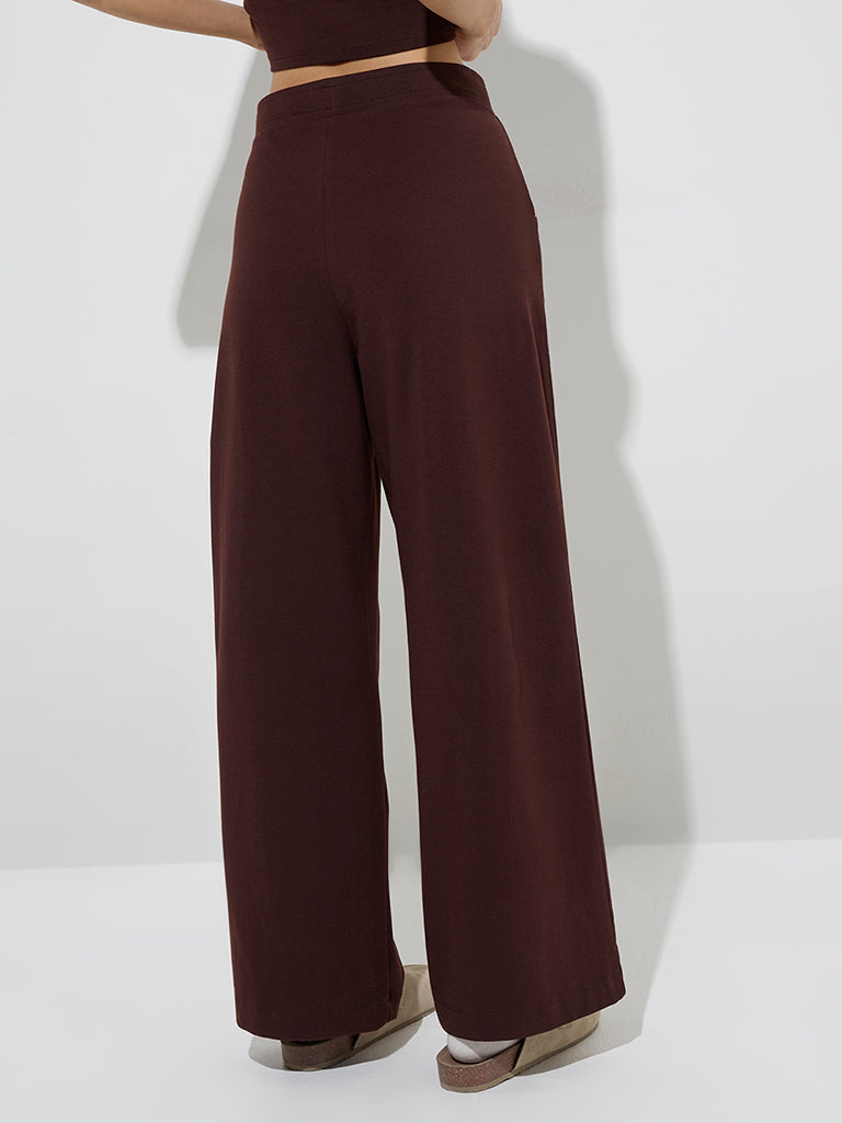 Westside Superstar Women's Brown Solid High-Rise Cotton Pants for Casual Wear Back View