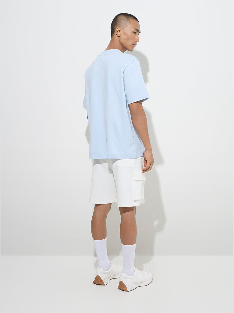 Westside Studiofit Men's Light Blue Text Design Relaxed-Fit Cotton T-Shirt for Sports Wear Back View