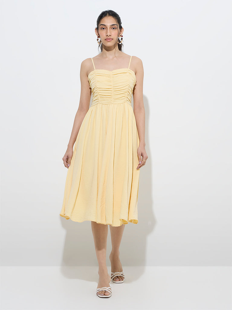 Westside LOV Women's Yellow Pleated Fit-and-Flare Dress for Casual Wear Front View