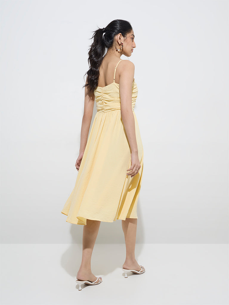 Westside LOV Women's Yellow Pleated Fit-and-Flare Dress for Casual Wear Back View