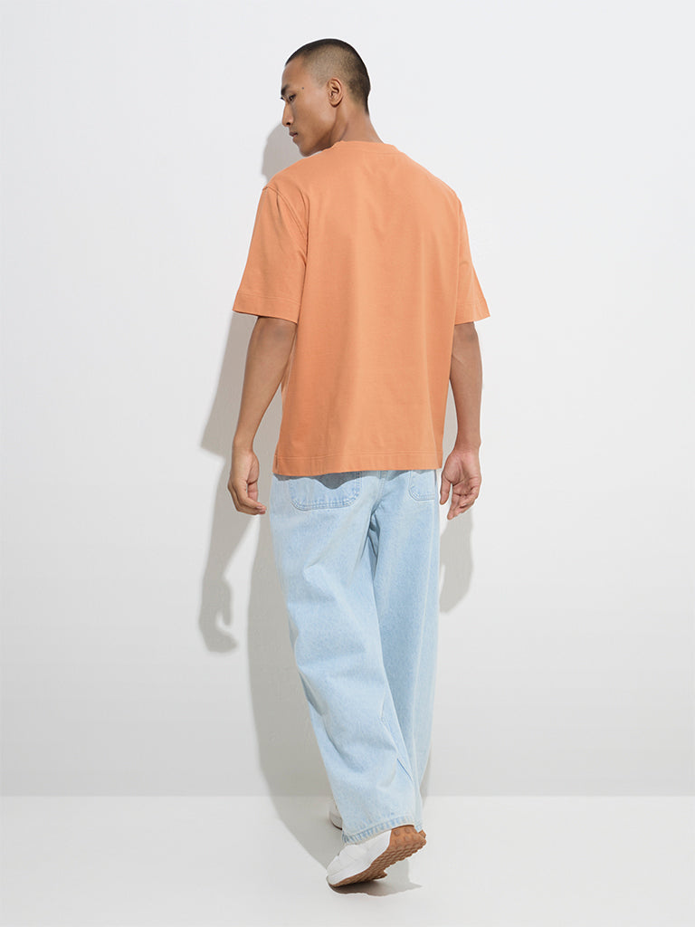 Westside Nuon Men's Orange Text Design Relaxed-Fit Cotton T-Shirt for Casual Wear Back View