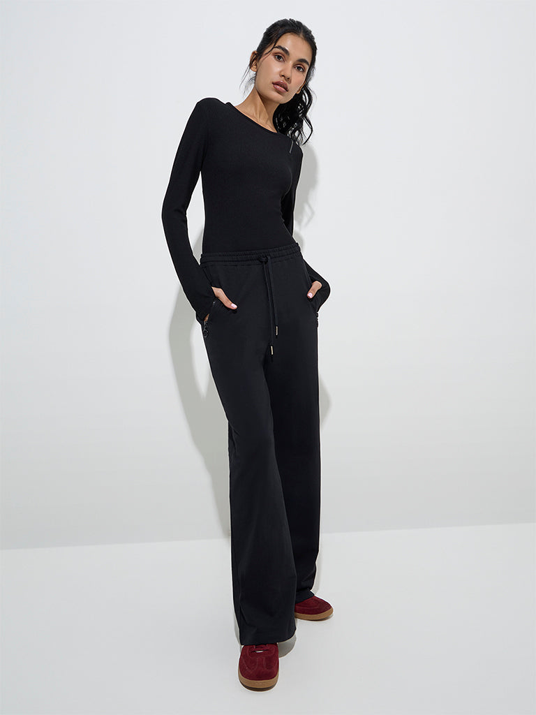 Westside Studiofit Women's Black Ribbed Textured Bodysuit for Sports Wear Full View