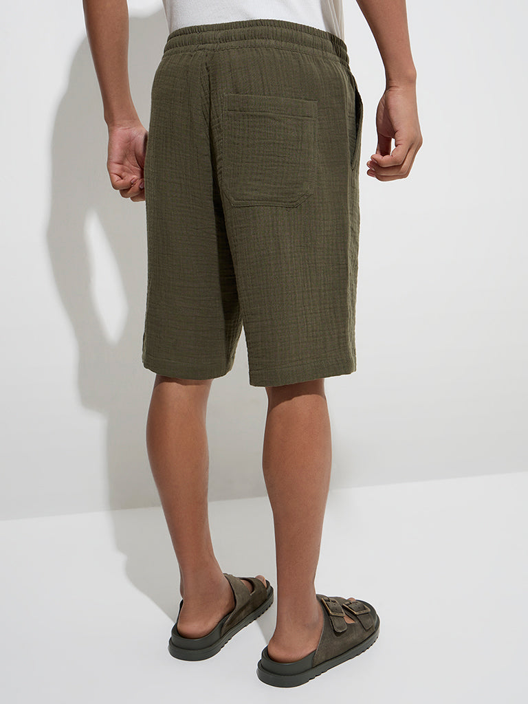 Westside ETA Men's Olive Textured Relaxed-Fit Mid-Rise Cotton Shorts for Casual Wear Back View