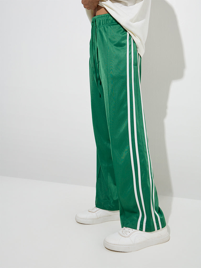 Westside Nuon Men's Jade Green Striped Relaxed-Fit Mid-Rise Track Pants for Casual Wear Front View