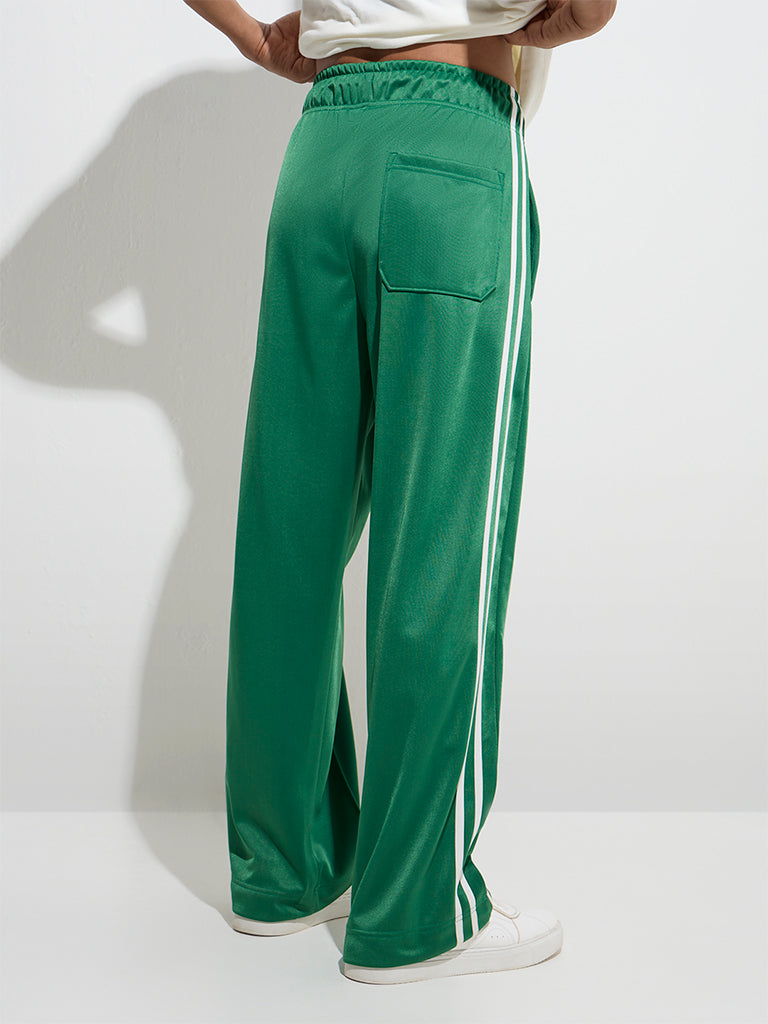 Westside Nuon Men's Jade Green Striped Relaxed-Fit Mid-Rise Track Pants for Casual Wear Back View