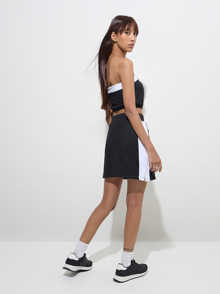 Westside Studiofit Women's Black Solid High-Rise Cotton-Blend Skirt for Sports Wear Back View