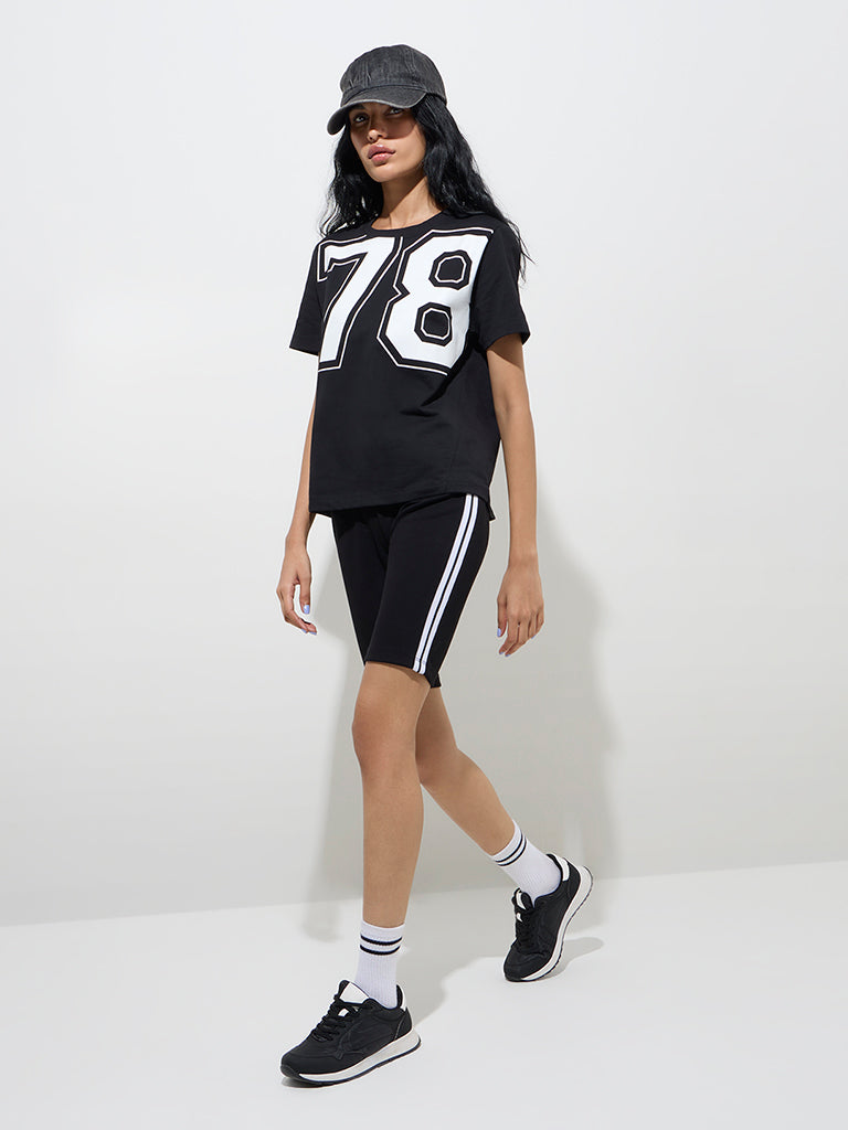 Westside Studiofit Women's Black Striped High-Rise Biker Shorts for Sports Wear Front View