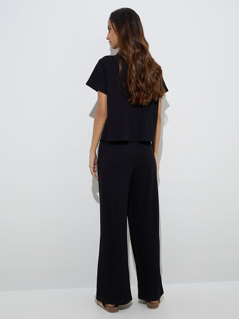 Westside Superstar Women's Black Waffle-Textured High-Rise Pants for Casual Wear Back View