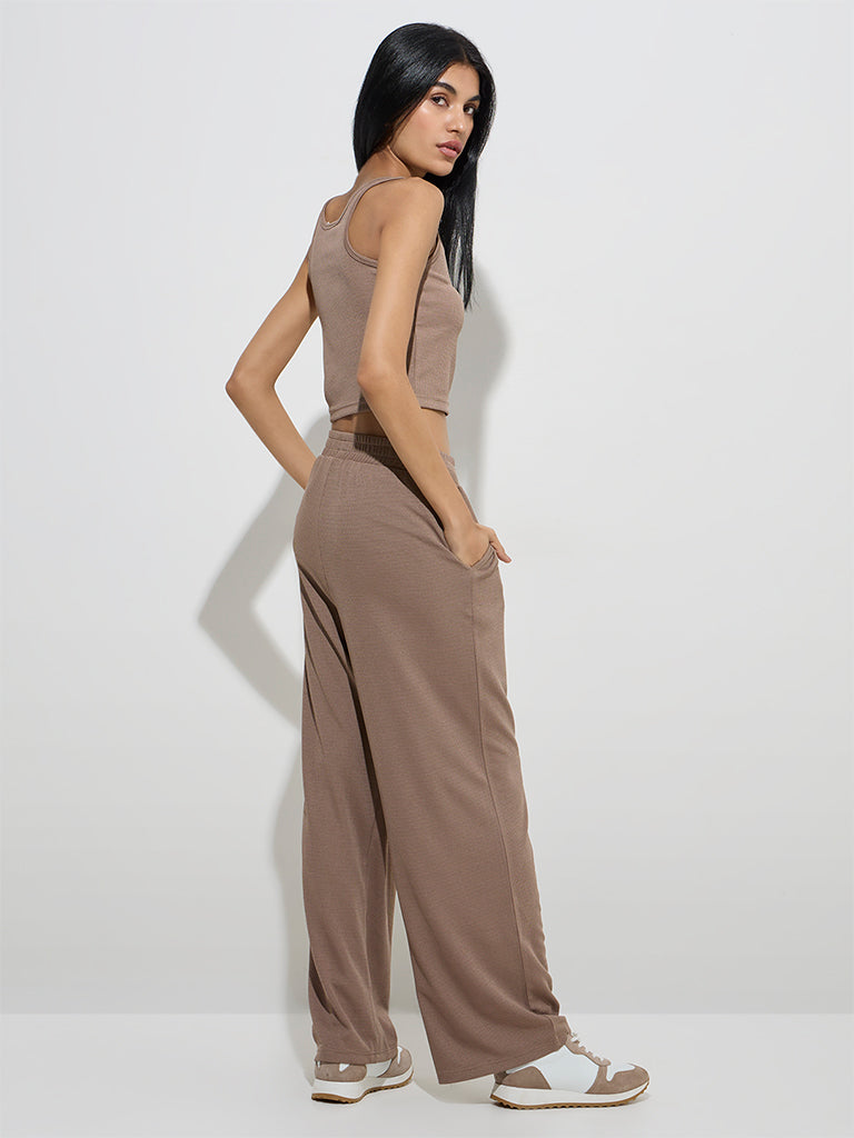 Westside Studiofit Women's Taupe Waffle-Textured High-Rise Track Pants for Sports Wear Back View