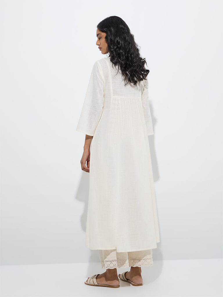 westisde Utsa Women's Off-White Embroidered A-line Cotton Kurta for Work Wear Back View