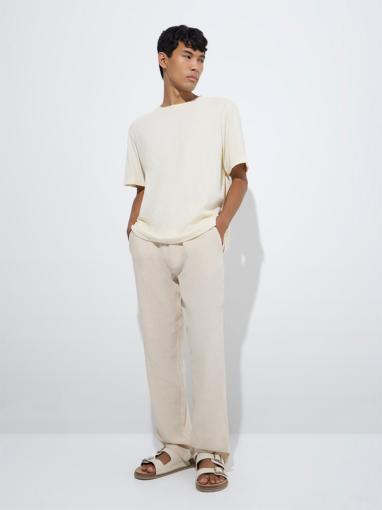 Westside ETA Men's Beige Relaxed-Fit Mid-Rise Cotton-Blend Chinos for Casual Wear Full Model View