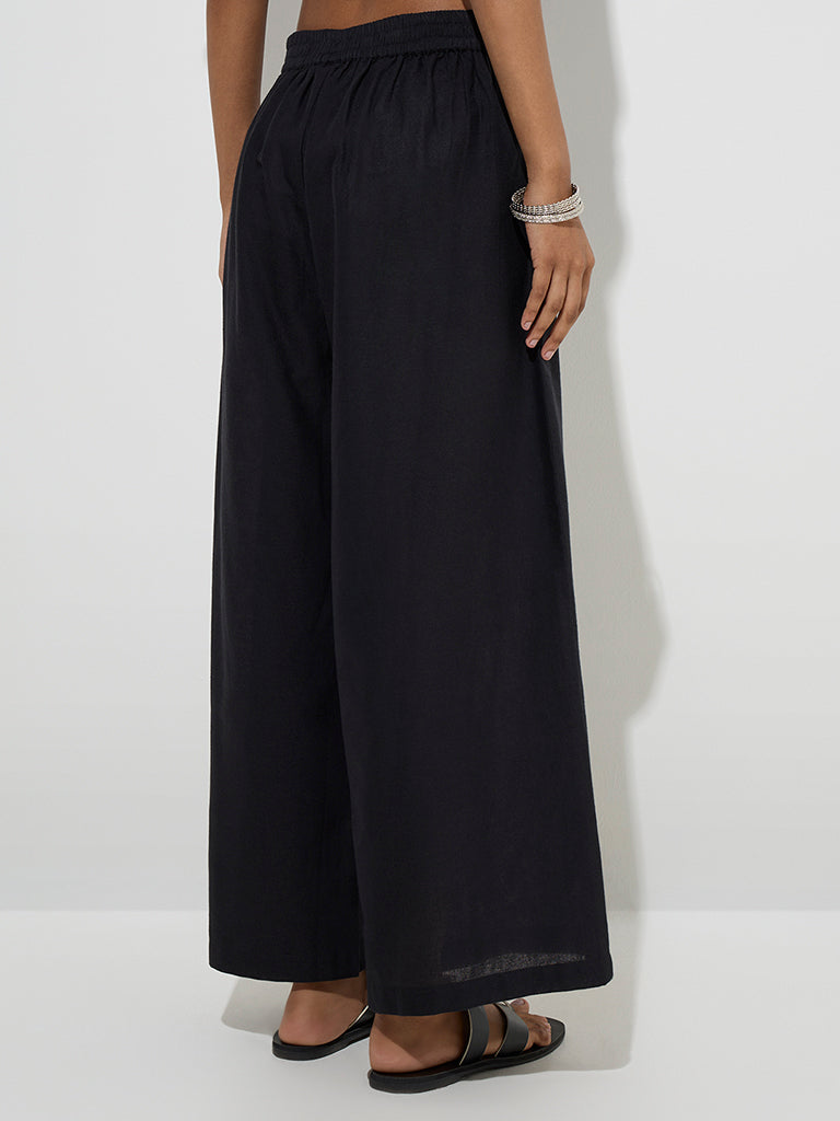 Westside Utsa Women's Black Floral Embroidered Cotton-Blend Palazzos for Work Wear Back View