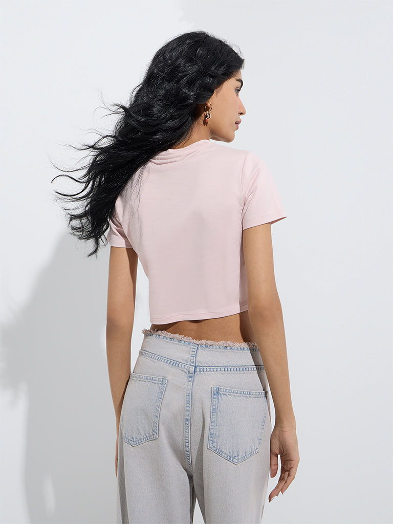 westisde Nuon Women's Light Pink Typographic Cotton T-Shirt for Casual Wear Back View