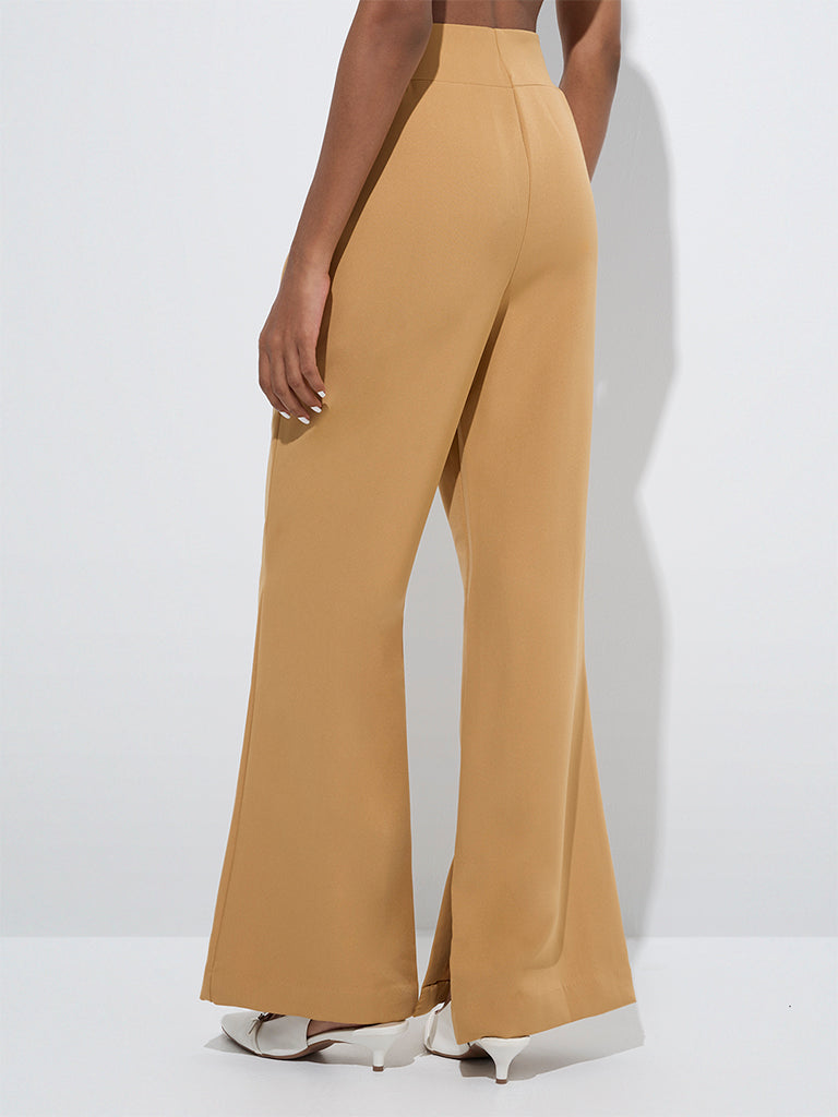 westisde Wardrobe Women's Beige Solid High-Rise Trousers for Work Wear Back View