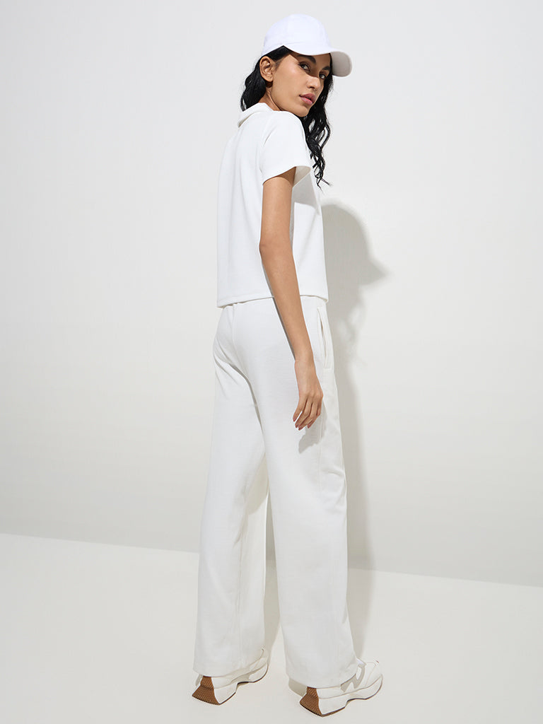 westisde Studiofit Women's White Ribbed Cotton-Blend Polo T-Shirt for Sports Wear Back View