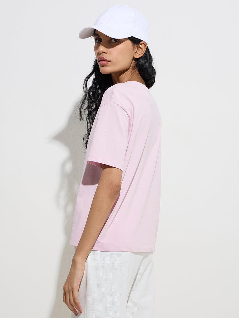 westisde Studiofit Women's Light Pink Text Design Cotton T-Shirt for Sports Wear Back View